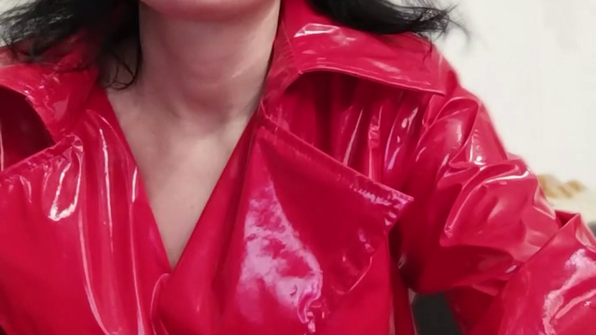 in red latex jacket tease you