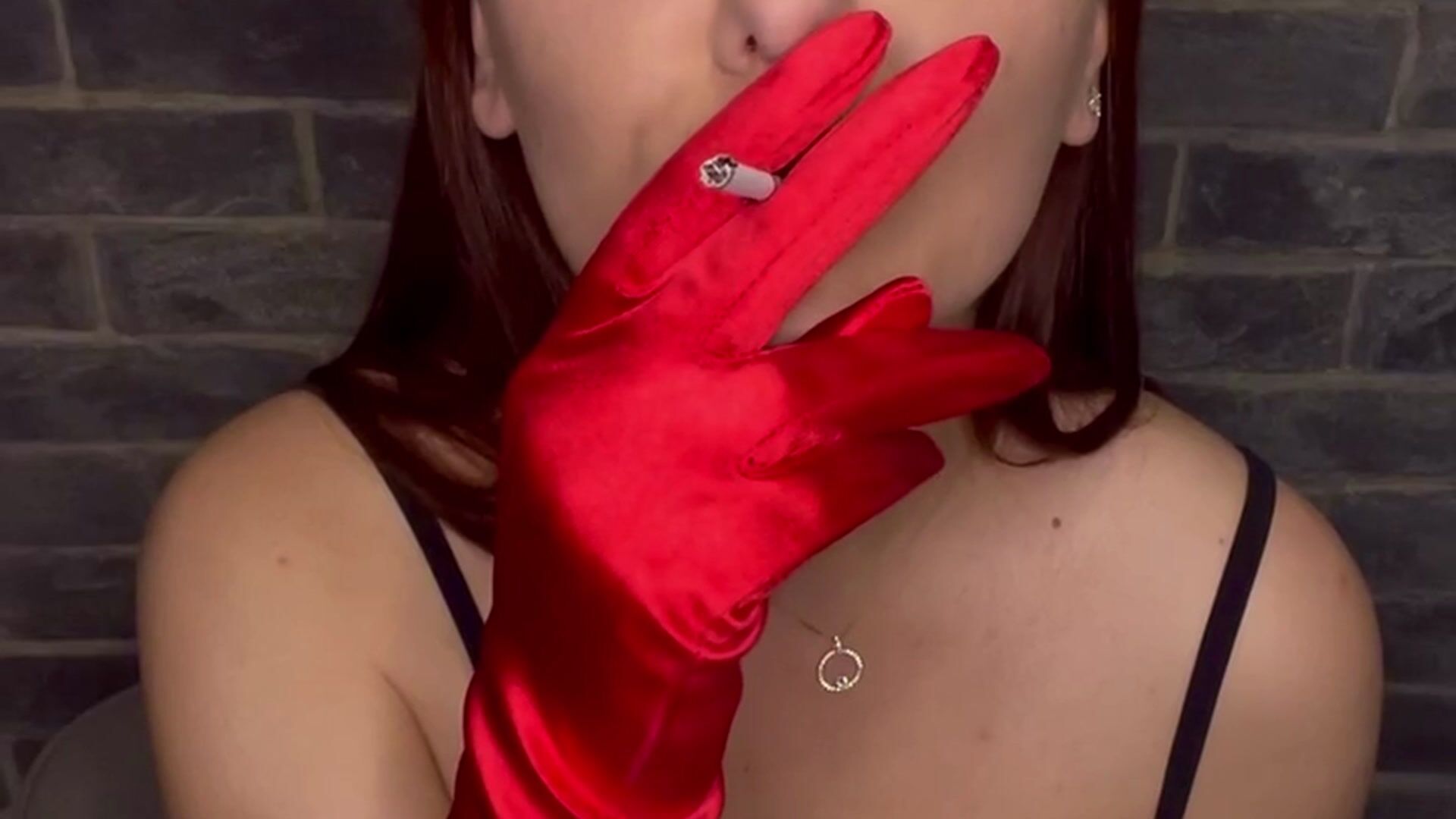 Red gloves and cigarette