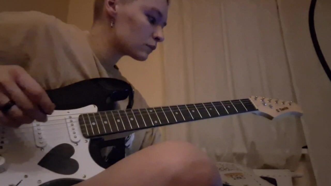 Guitar with additional sound