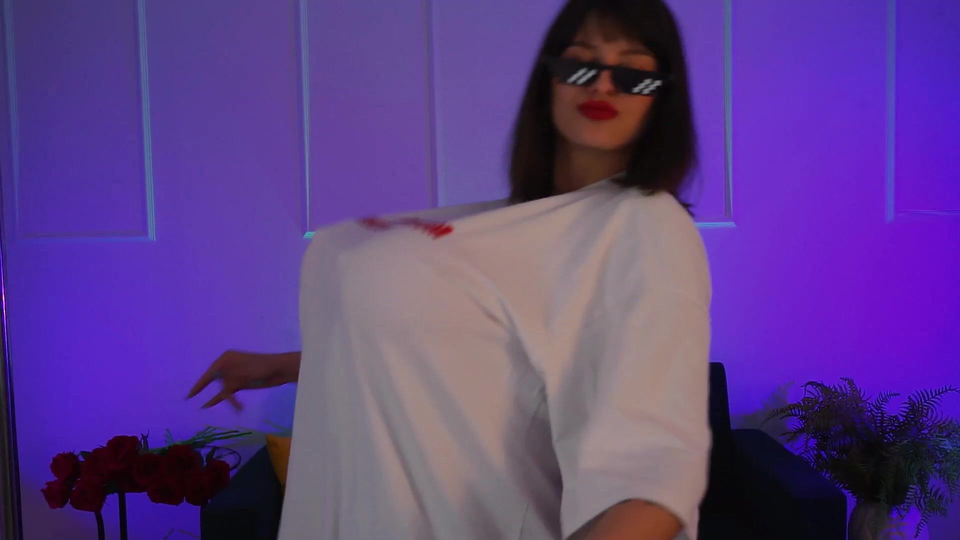 dancing with huge boobs in a white T-shirt