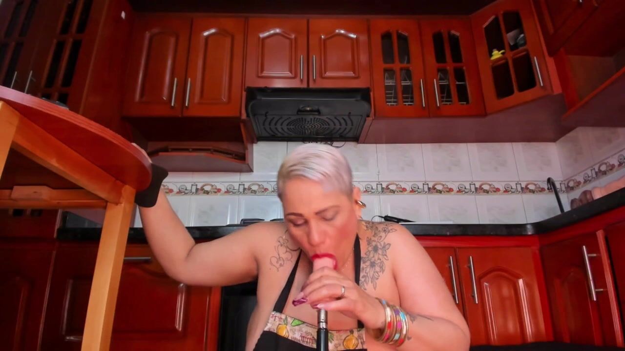 THE COOK LIKES TO SUCK THE DILDO BEFORE COOKING