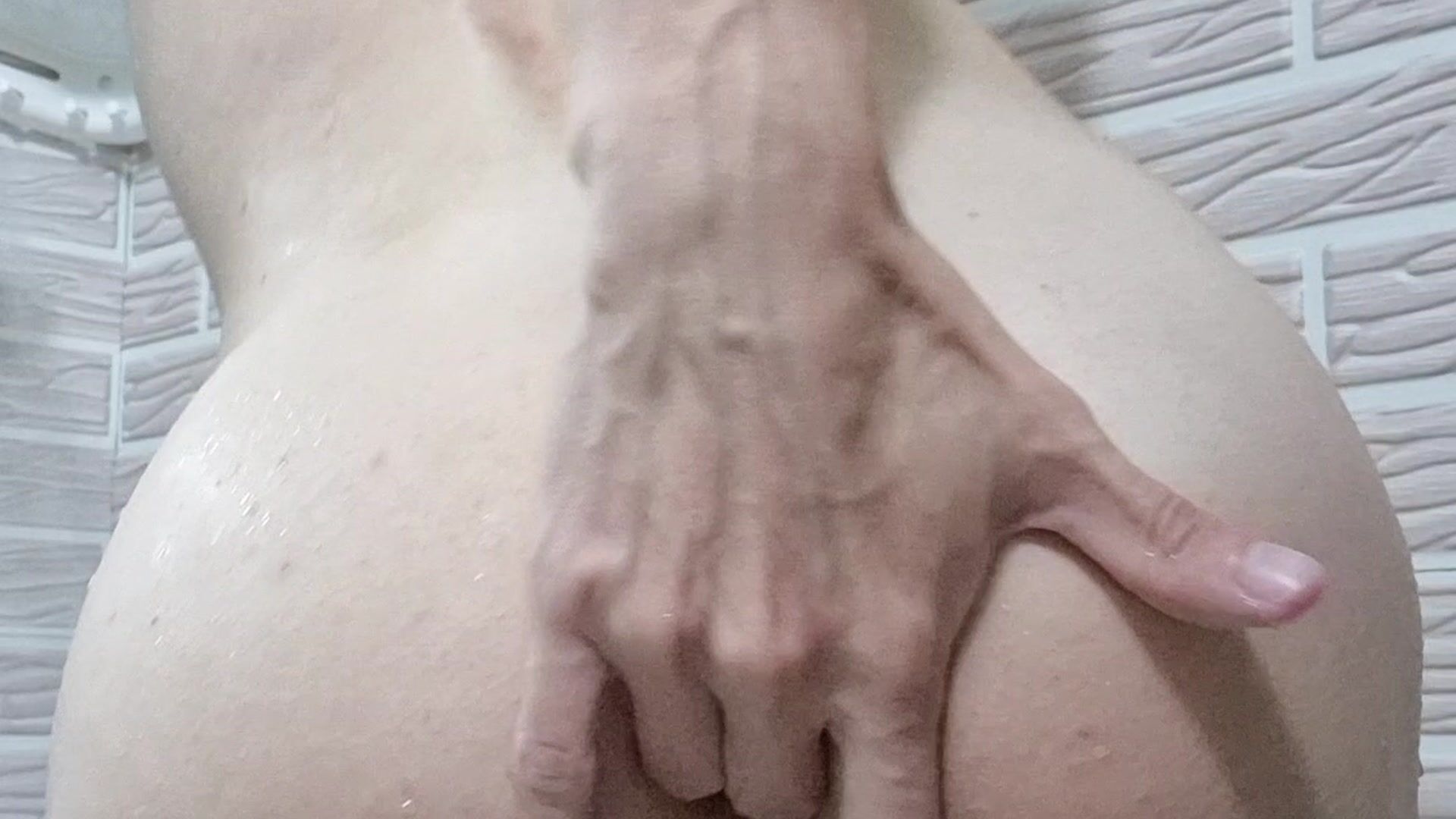 Dildo play in a shower with cumshot