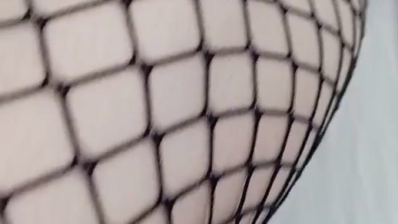 Feet teasing - fishnet stockings