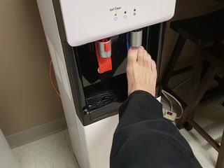 Barefoot toes in watercooler at wirk