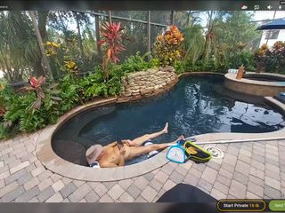 Naked floating in pool