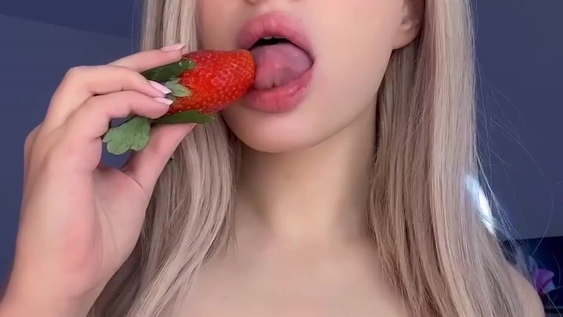 eating a strawberry