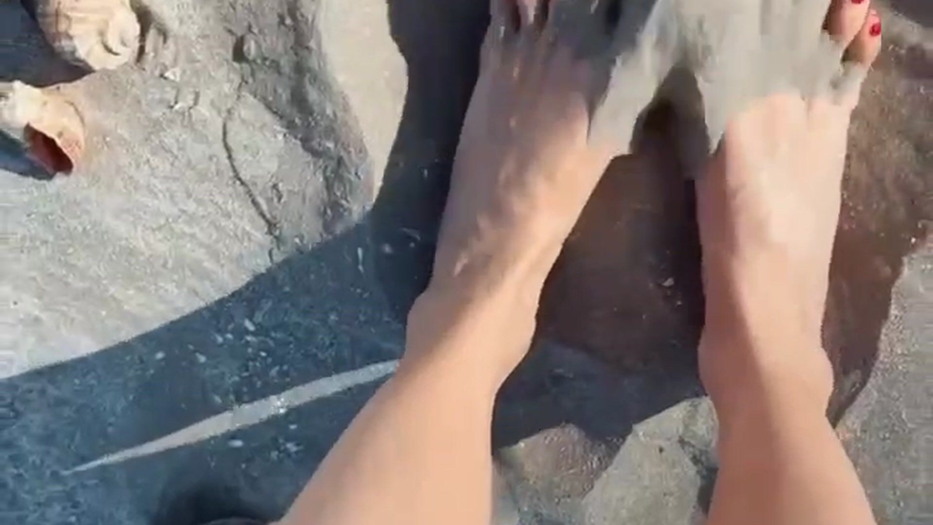 Playful feet in the sand