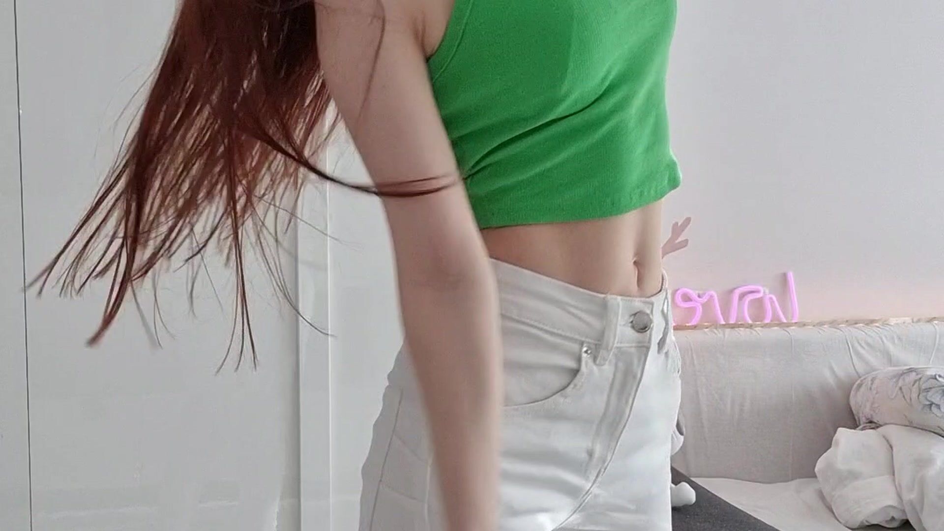 White jeans & green top