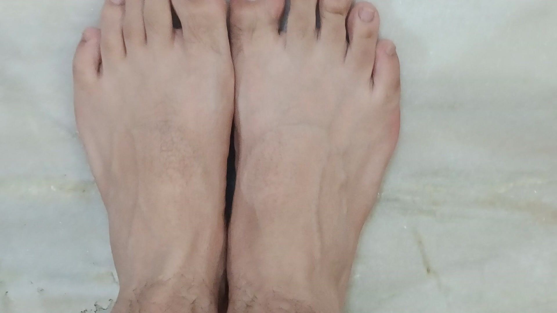 Removing socks from the Manly feet