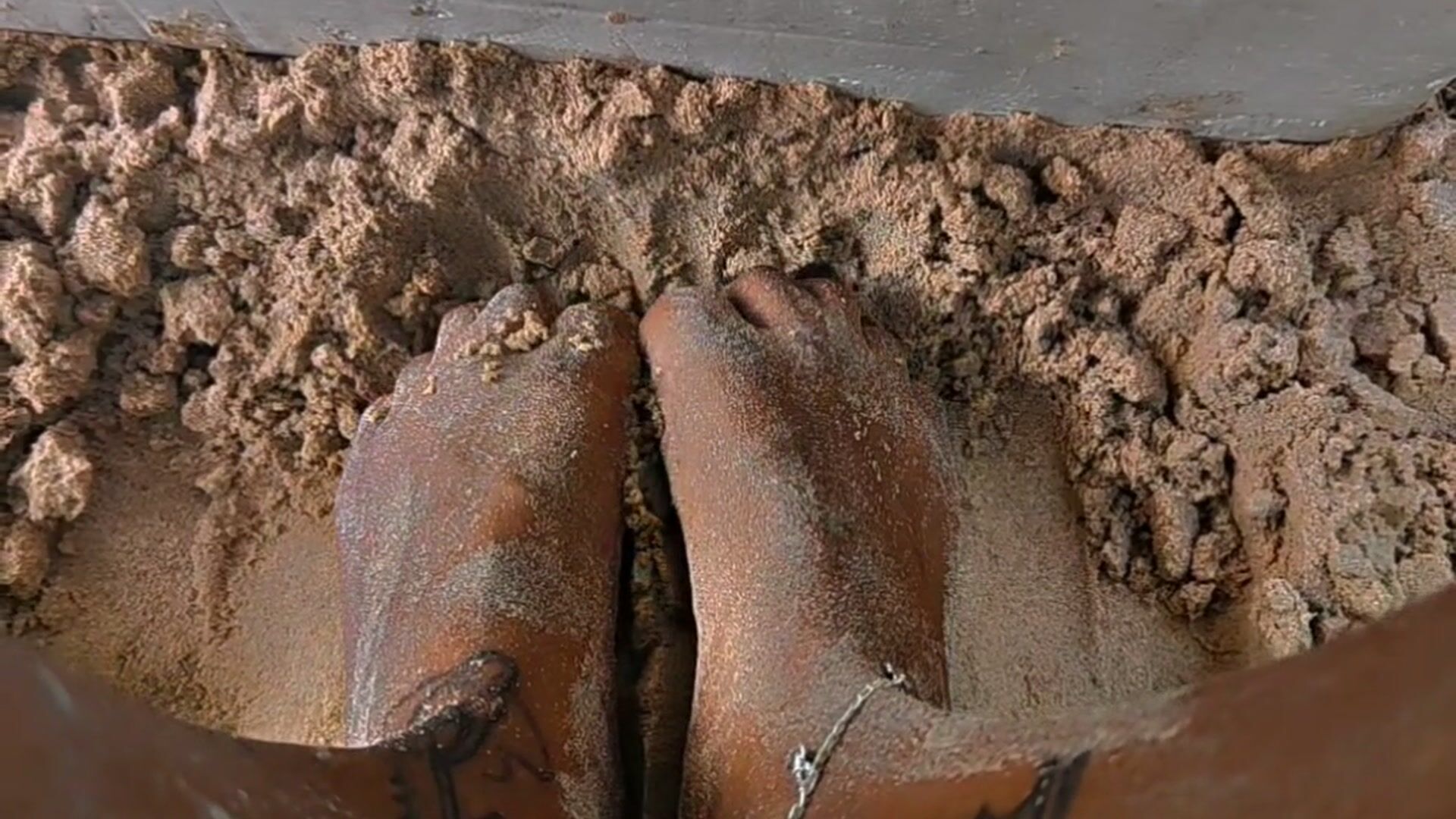 feet in the sand