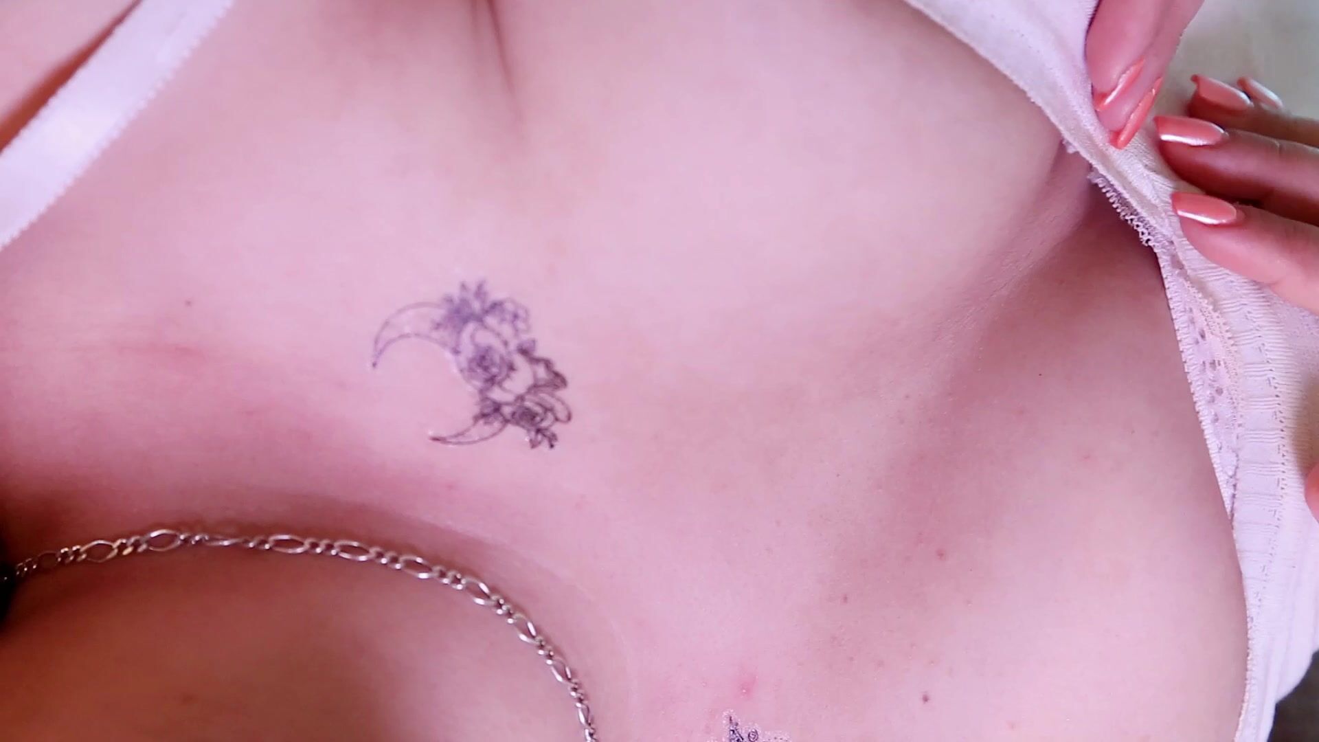 Tattoo on my collarbones and luscious cleavage