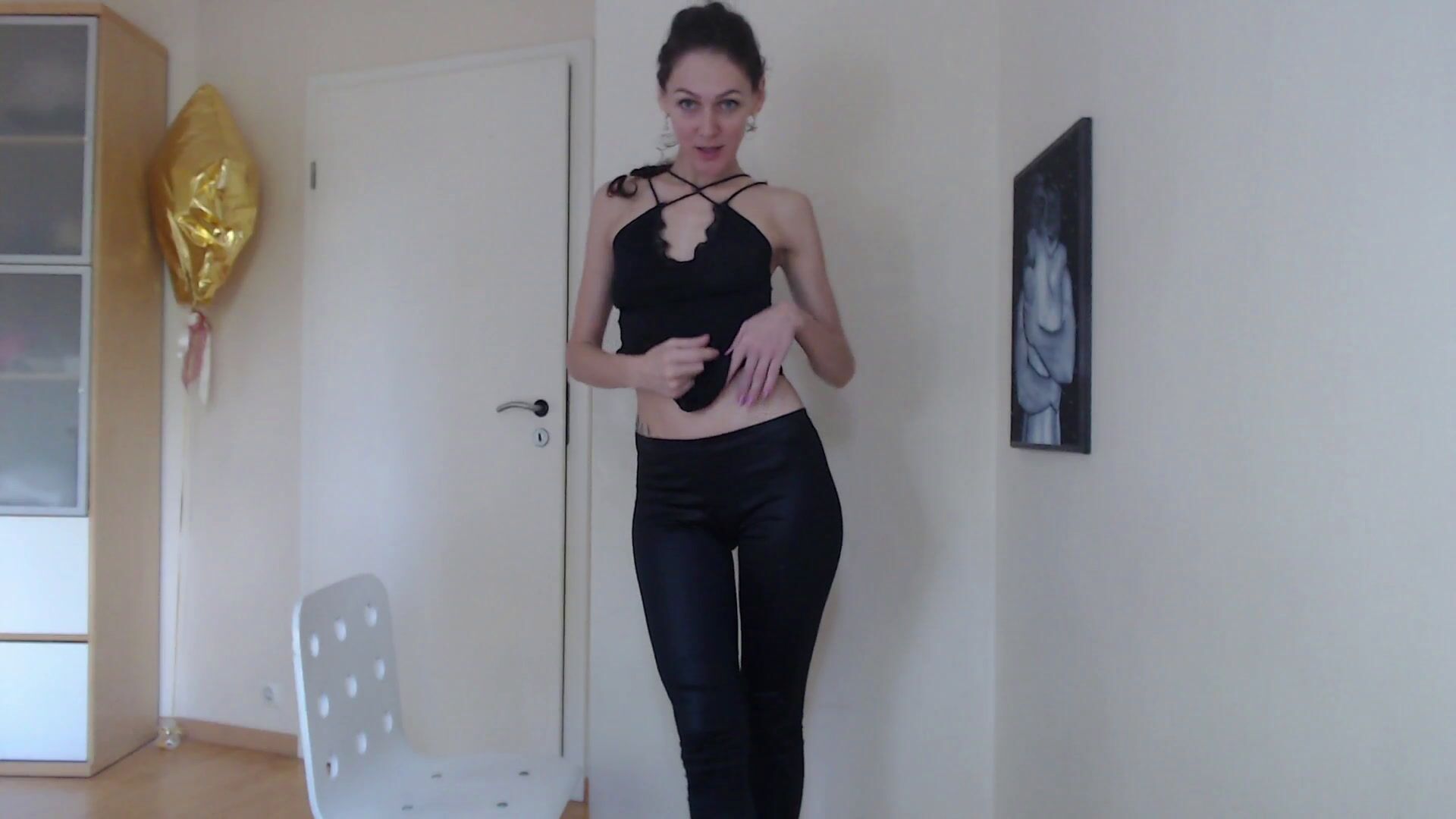 Black leggings. I'm like a little black kitty, squirming and teasing you in a black top and black le