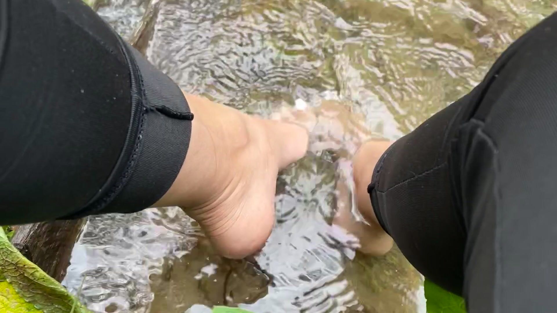 Feet in the river