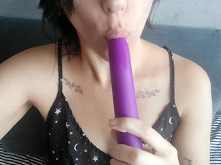 sucking a dildo