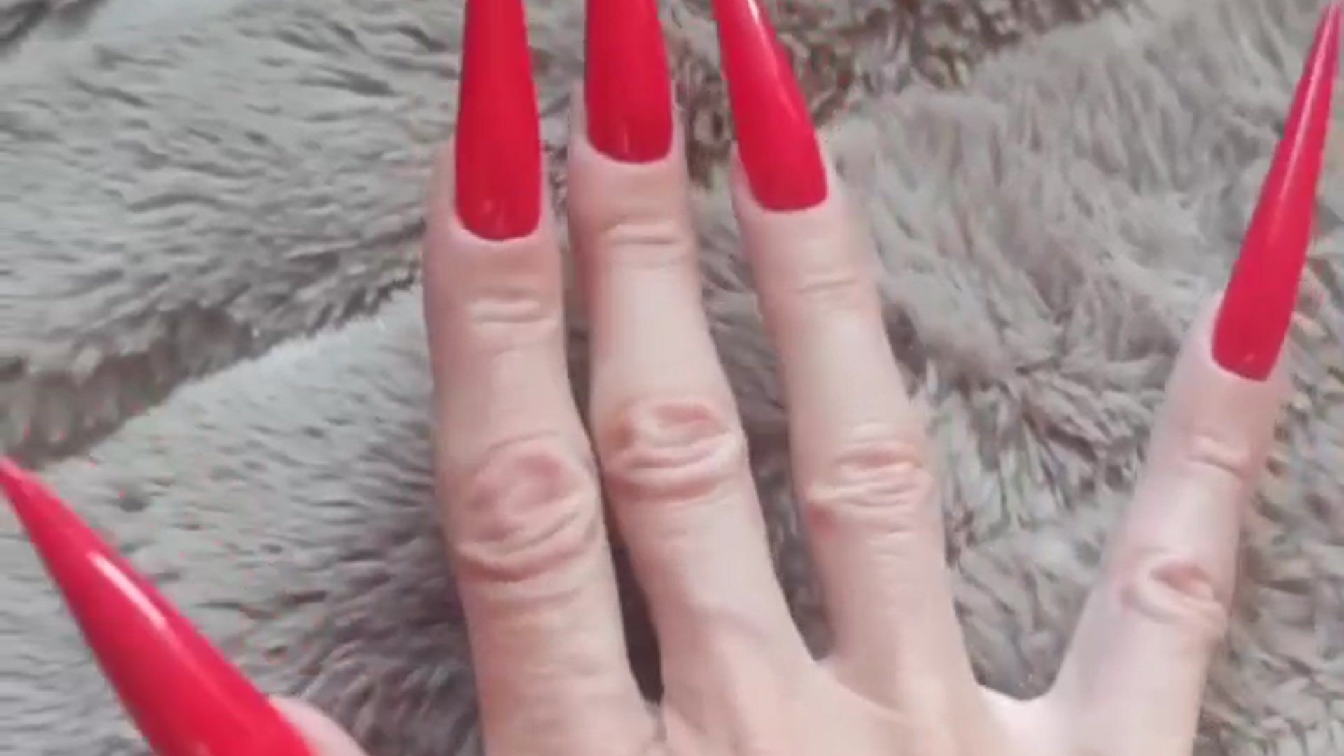 Extremely long RED nails. I want to play with your dick and scratch it