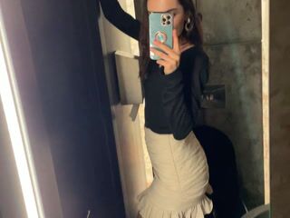 in a miniskirt at a party
