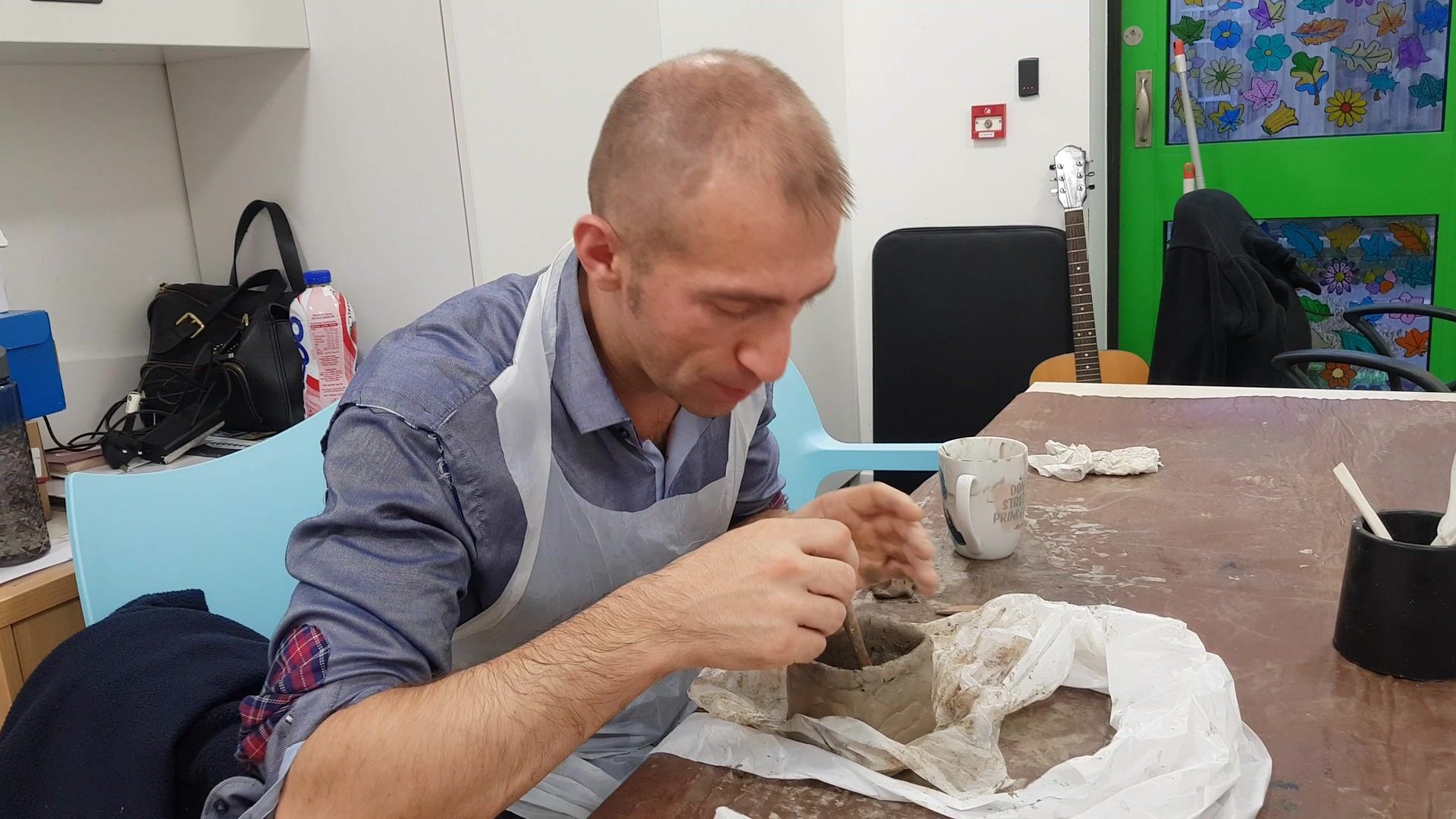 Sculpting moulding clay tea lights together with other people's designs