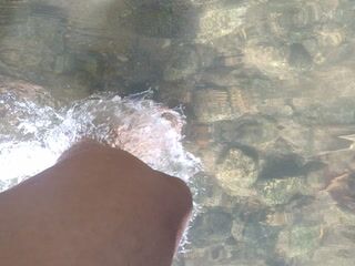 My feet felt the water and the sand