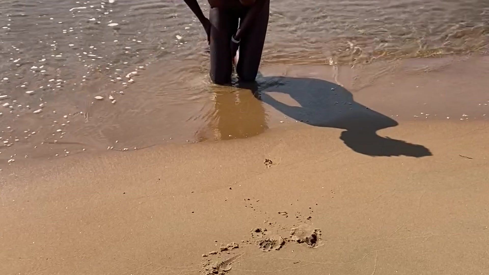 Nude bath at the beach