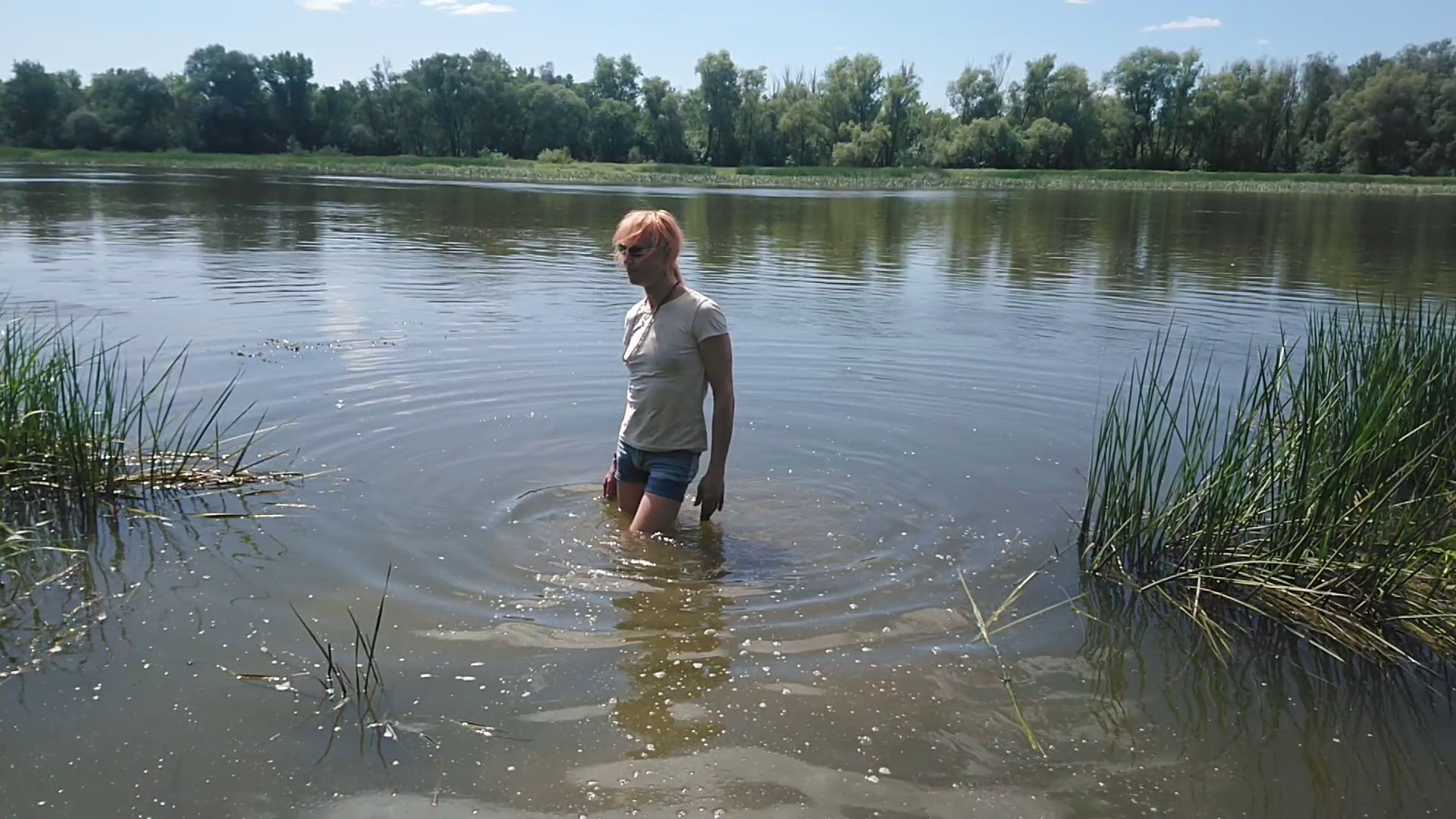 Swimming in the river in shirts and t-shirt...