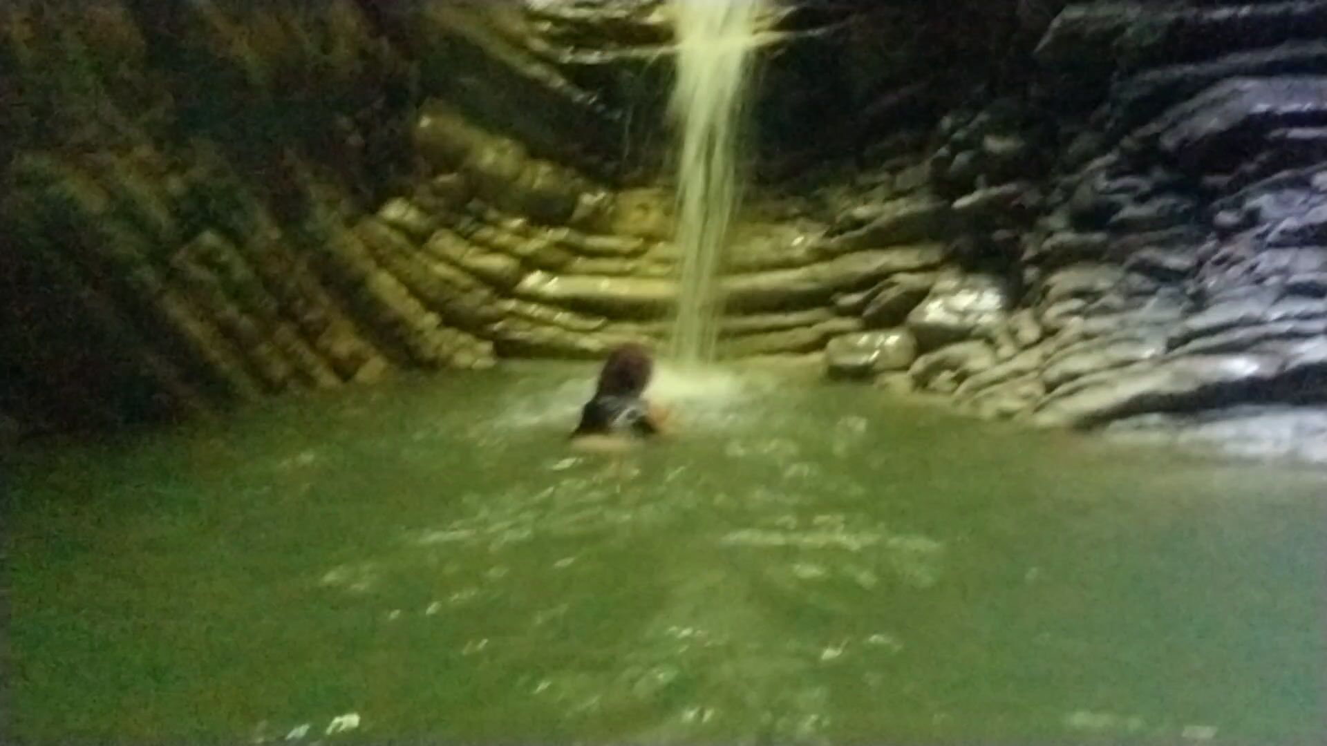 Swimming at waterfall in shirt and t-shirt... its cold but cool!