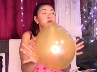 blowing up balloons