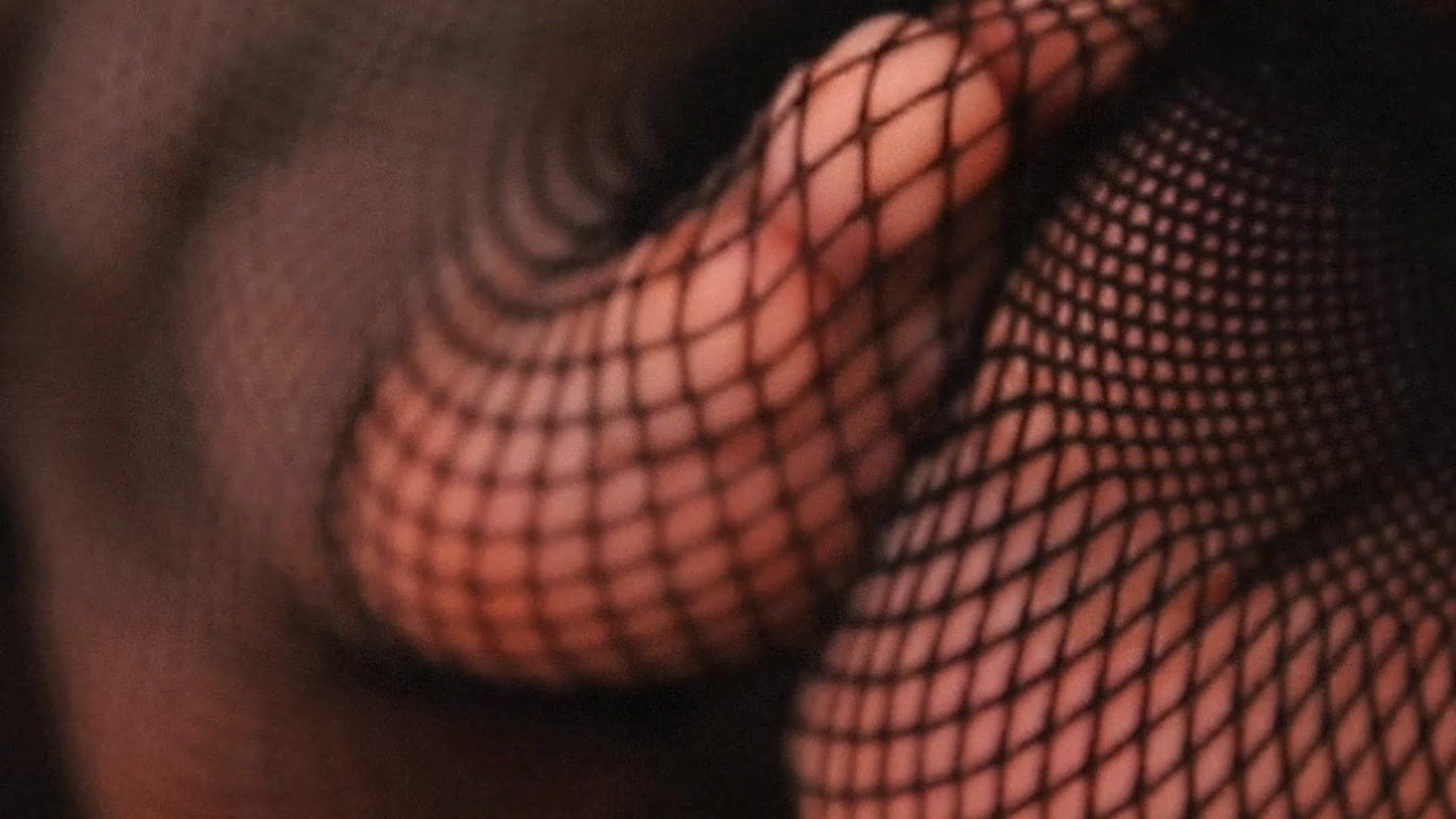 Big ass with fishnet stockings tease