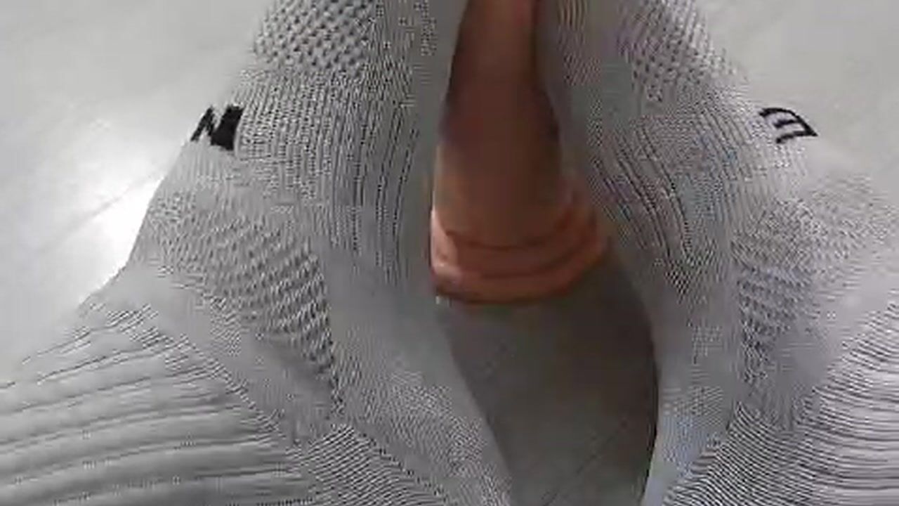 I MASTURBATE THE DILDO WITH MY FEET AND WHITE SOCKS