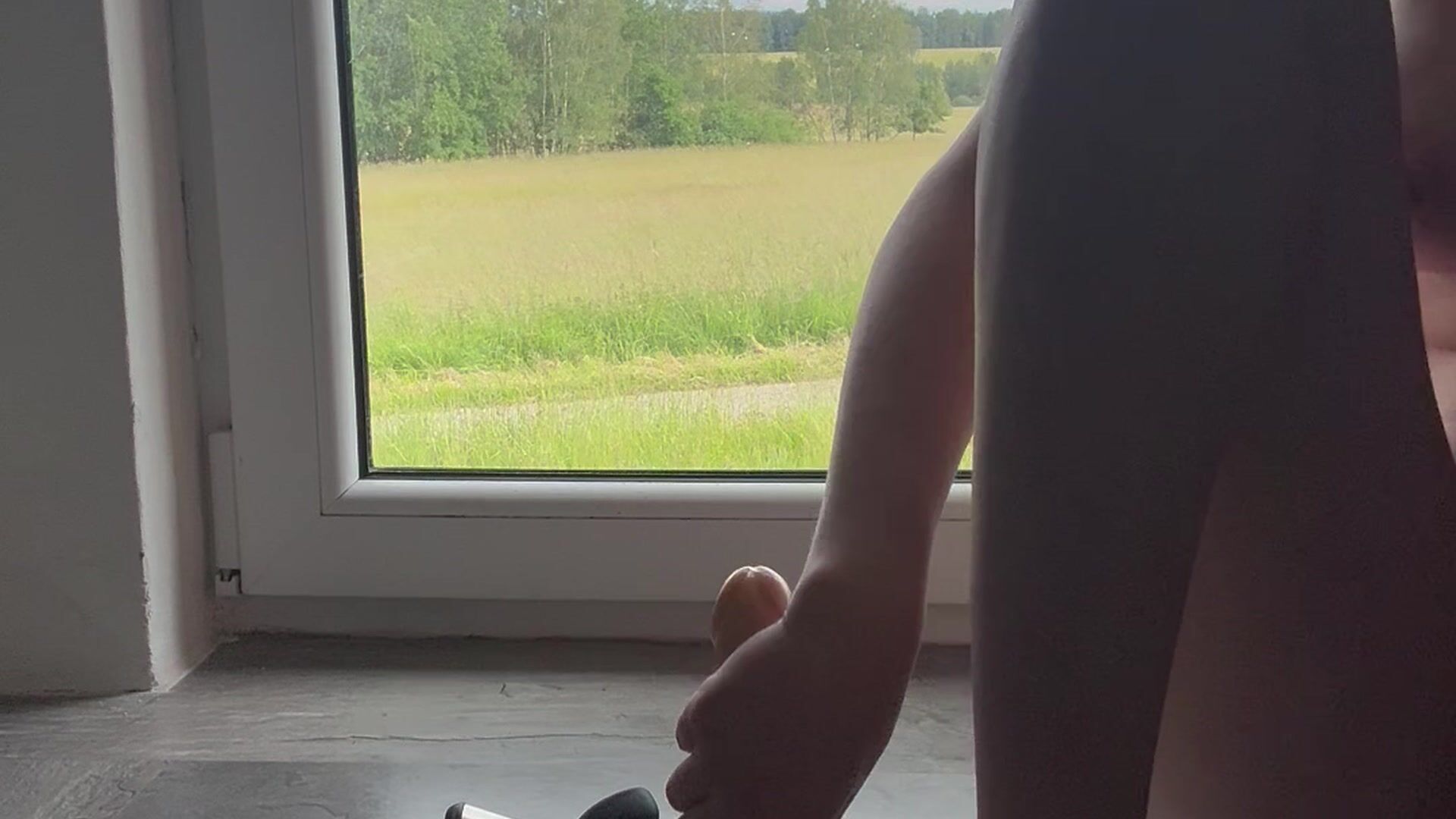 Riding dildo in front of window ;)