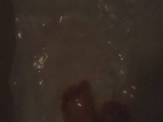 Feet underwater slow motion