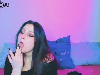 goth girl licking fingers